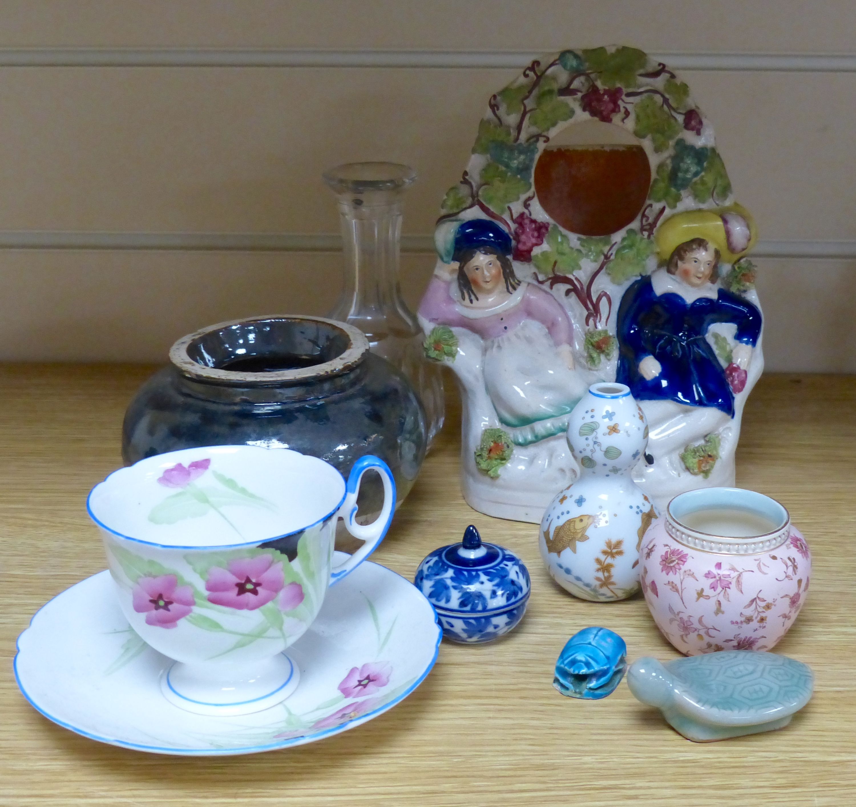 A group of ceramics including a Shelley cup and saucer, a Staffordshire flatback, a Wedgwood miniature bowl etc.